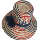 Handmade Bohemian Straw Hat with bold blue and red accents and a traditional pompom