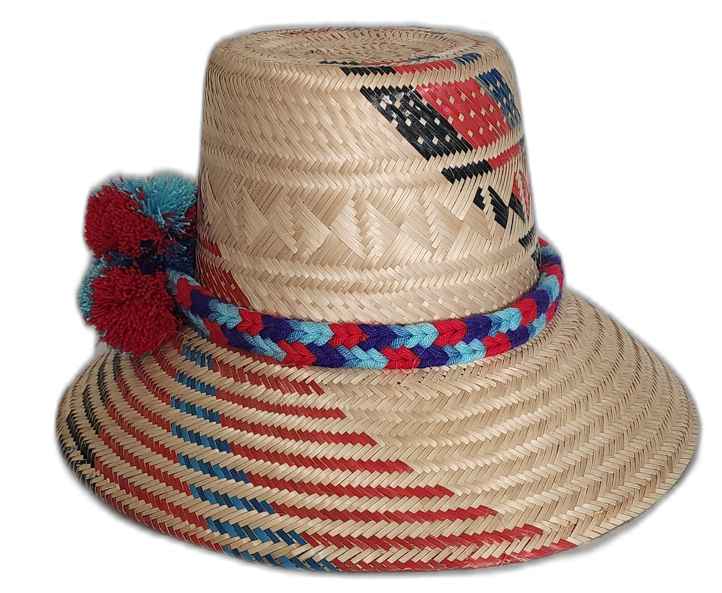 Boho chick straw hat featuring red and turquoise pompoms and tribal weave