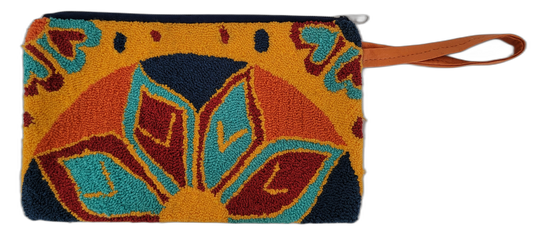 Boho chick clutch with orange strap and bold punch needle design in jewel tones


