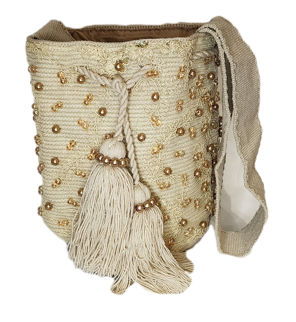 Boho chick bag featuring neutral tones, delicate embellishments, and wide strap.