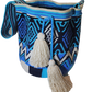 Boho chick bag featuring bold tribal designs and large cream tassels.