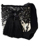 Boho chick evening bag in black with large tassels and crystal embellishments.