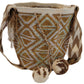 Boho chick crochet bag featuring neutral earth tones, shimmer, and tassels.