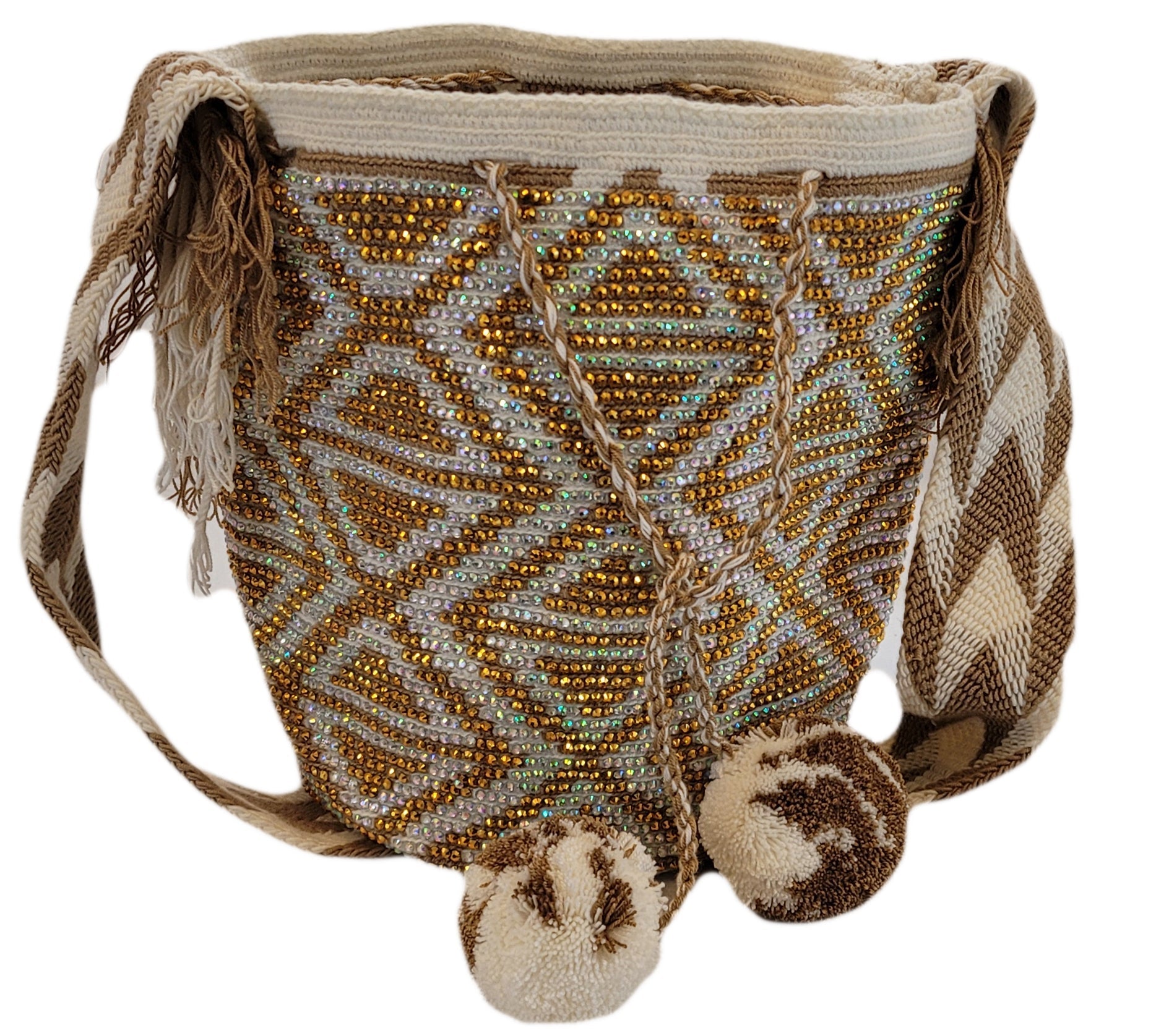 Boho chick crochet bag featuring neutral earth tones, shimmer, and tassels.