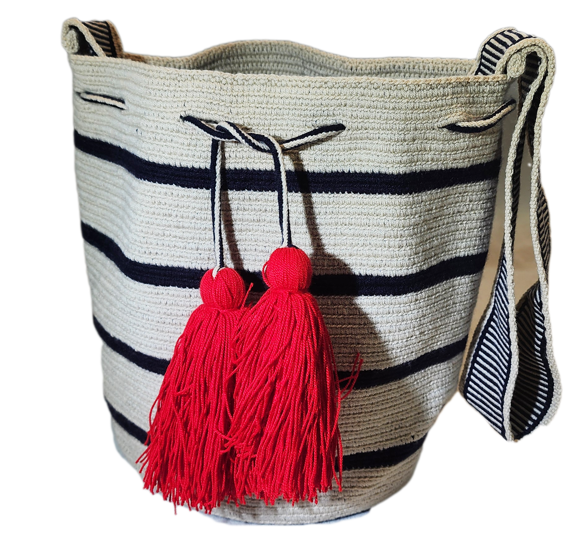Nautical-inspired boho chick bag featuring bold red tassels and stripes.