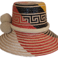 Boho Chick straw hat featuring vibrant red, yellow, and white pattern with soft white pompoms.