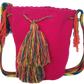 Artisan-crafted Bohemian Wayuu bag in pink, adorned with colorful tassels and a rainbow strap — perfect for summer flair.