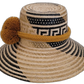 Unique Wayuu artisan straw hat, featuring bold black weave and golden mustard pompom accents.

