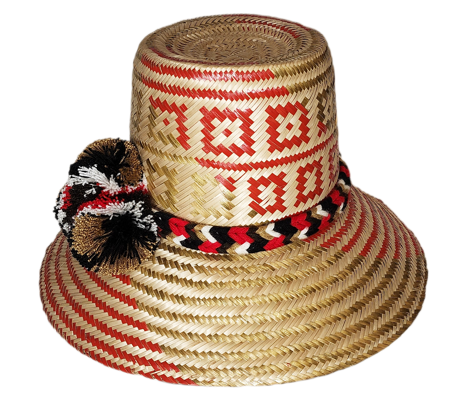 "Handmade colorful Wayuu hat from Colombia and Venezuela, crafted from Iraca palm fibers, decorated with symbolic pompoms."