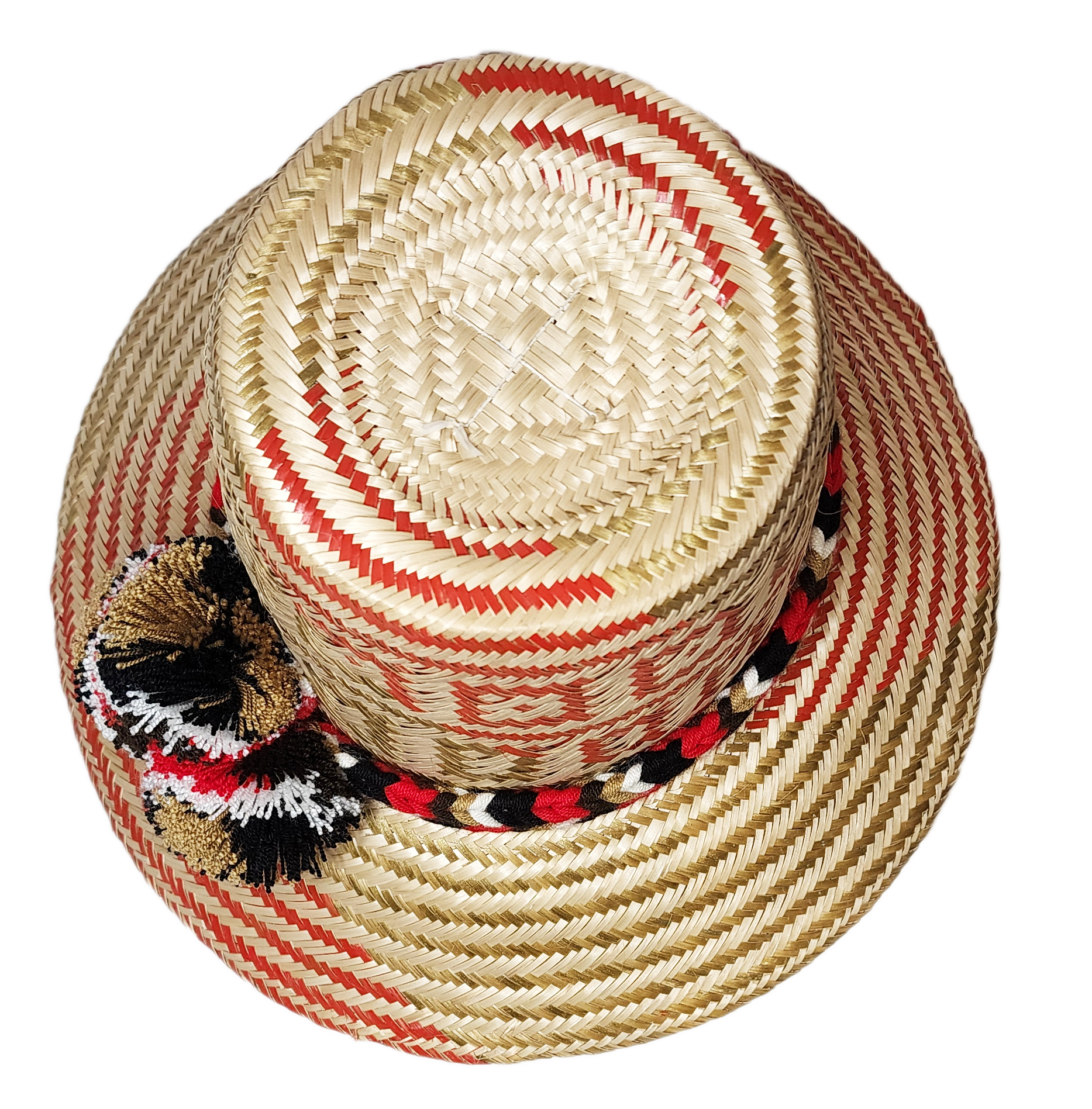 "Handmade colorful Wayuu hat from Colombia and Venezuela, crafted from Iraca palm fibers, decorated with symbolic pompoms."