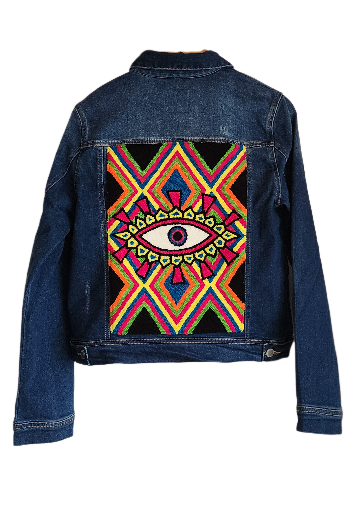 "Handmade denim jacket with vibrant punch needle embroidery on the back, showcasing unique artisan craftsmanship."
