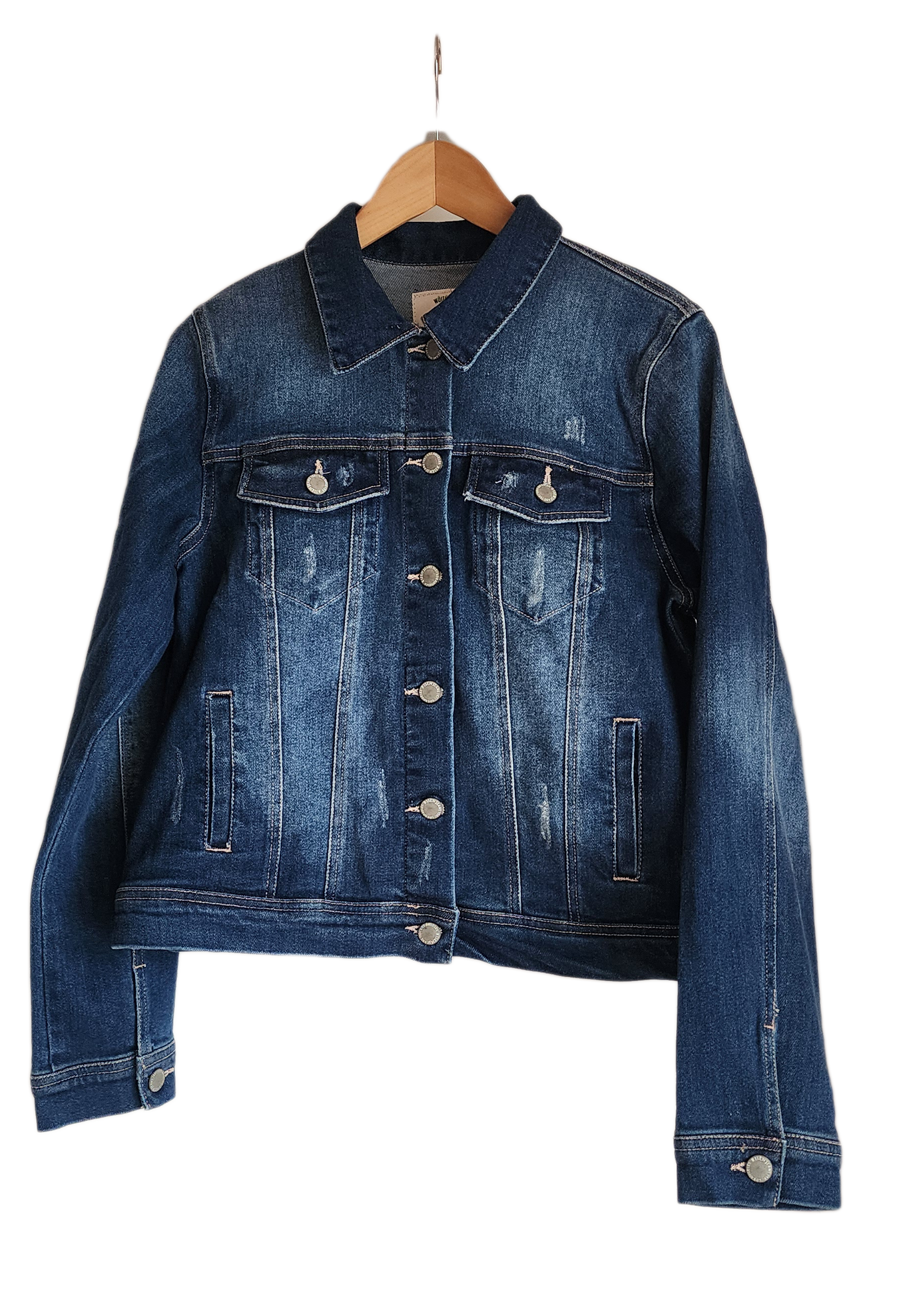 "Handmade denim jacket with vibrant punch needle embroidery on the back, showcasing unique artisan craftsmanship."