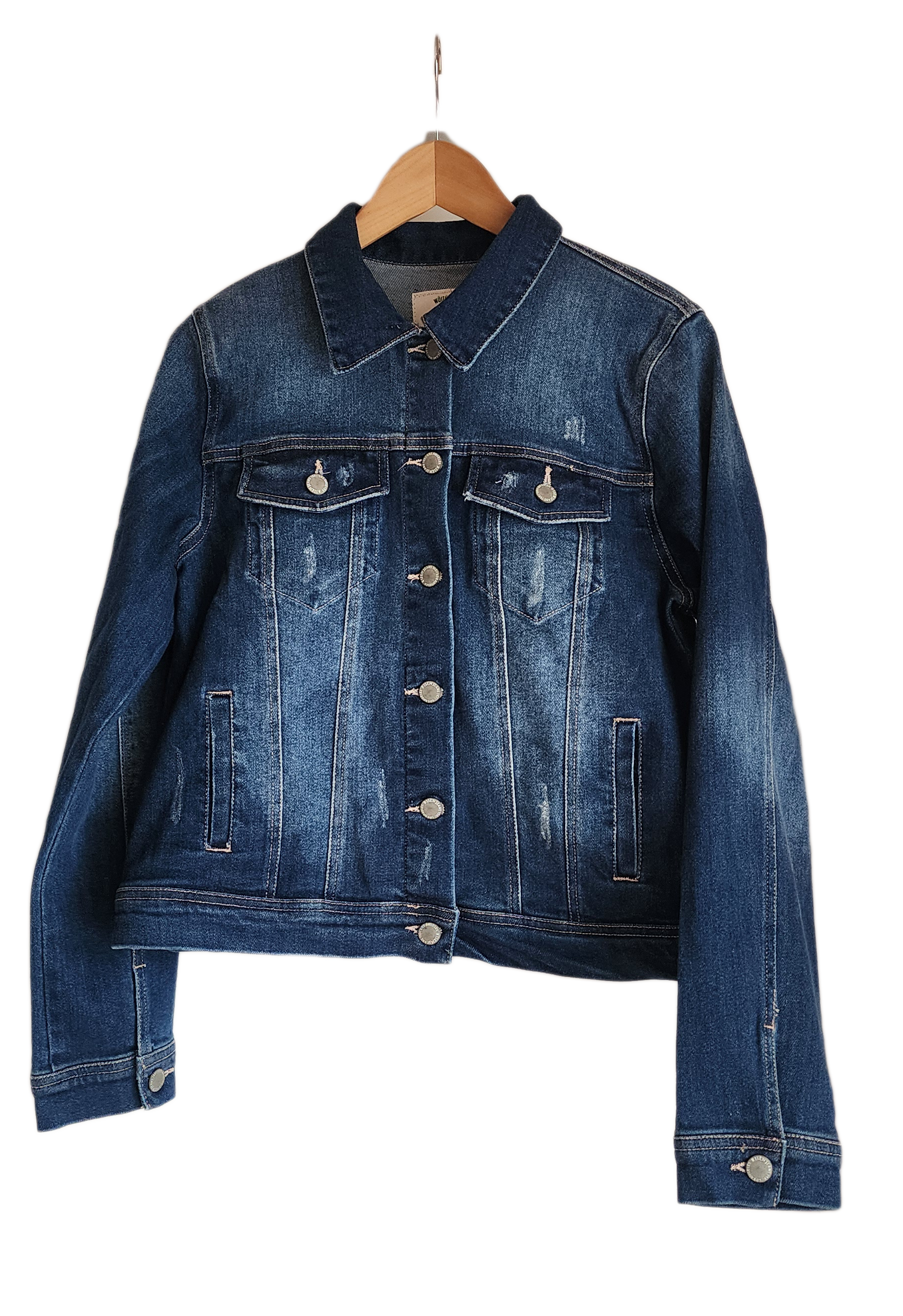 "Handmade denim jacket with vibrant punch needle embroidery on the back, showcasing unique artisan craftsmanship."