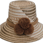 Handmade Wayuu straw hat in earthy beige tones with brown pompoms.

