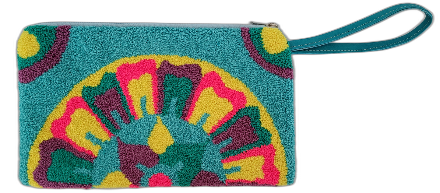 Bohemian crochet clutch with teal background and punch needle floral pattern

