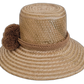 Artisan solid straw Wayuu hat with brown pompom accents.

