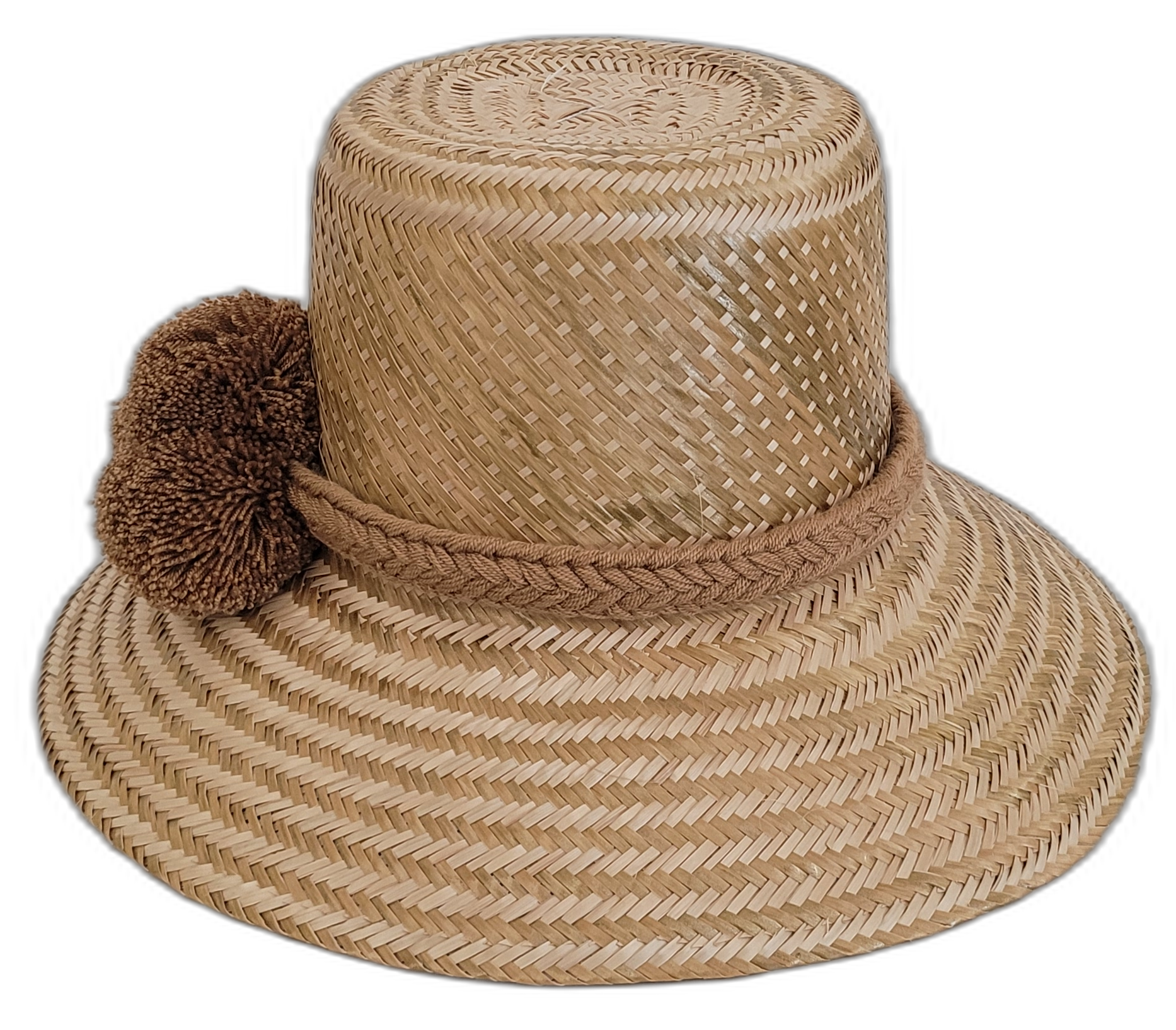 Artisan solid straw Wayuu hat with brown pompom accents.

