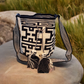 "Handmade Paleteada Crochet Wayuu Bag, colorful and bohemian, crafted by Wayuu artisans, supporting sustainable livelihoods."