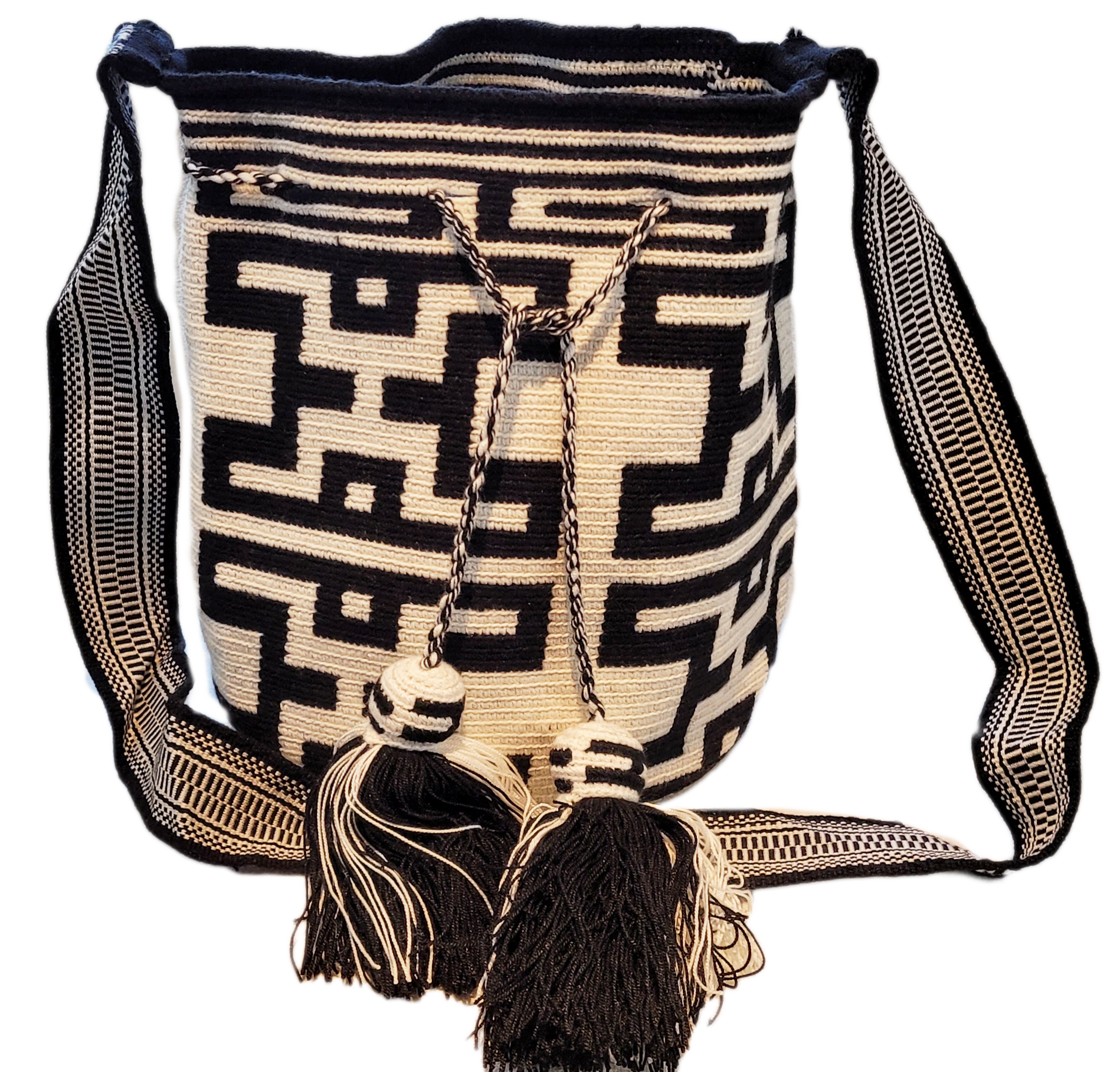"Handmade Paleteada Crochet Wayuu Bag, colorful and bohemian, crafted by Wayuu artisans, supporting sustainable livelihoods."