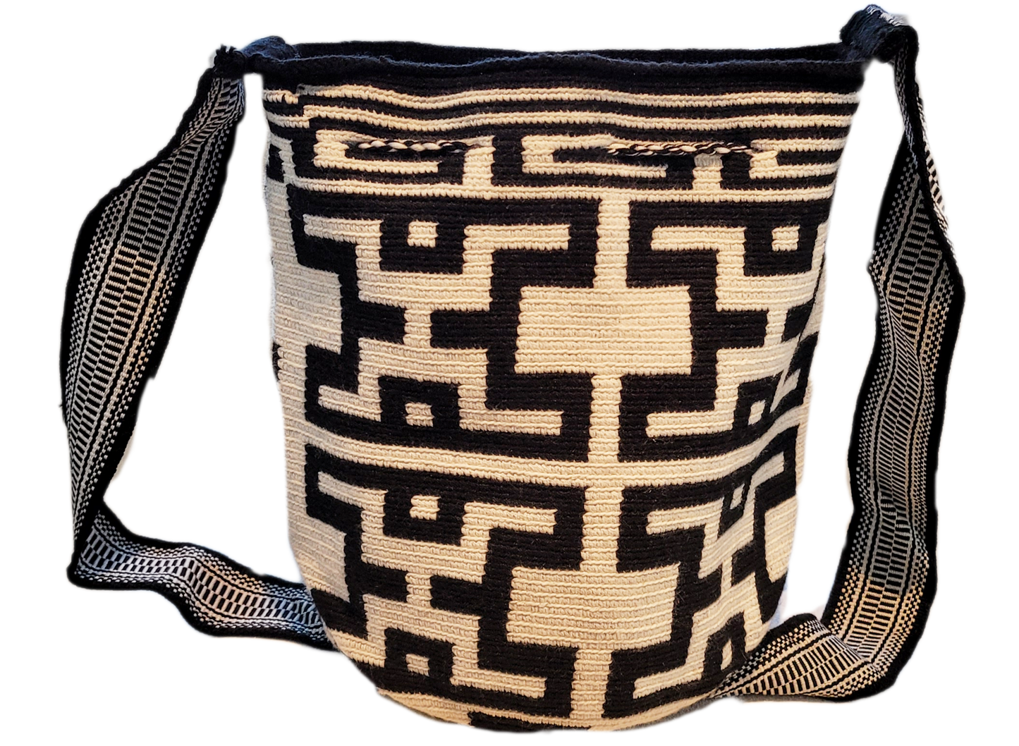 "Handmade Paleteada Crochet Wayuu Bag, colorful and bohemian, crafted by Wayuu artisans, supporting sustainable livelihoods."