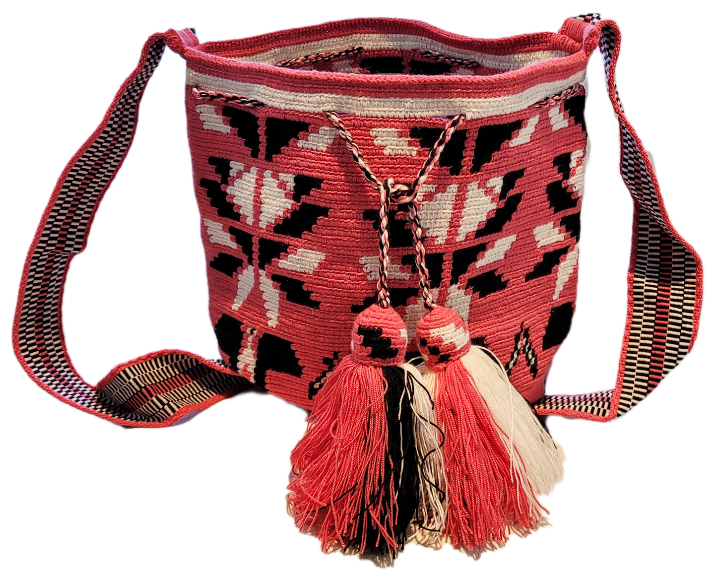 "Handmade Paleteada Crochet Wayuu Bag with colorful geometric patterns, crafted by the Wayuu tribes, featuring a versatile st