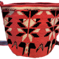 "Handmade Paleteada Crochet Wayuu Bag with colorful geometric patterns, crafted by the Wayuu tribes, featuring a versatile st