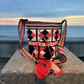 "Handmade Paleteada Wayuu crochet bag, colorful and bohemian, crafted by Colombian and Venezuelan artisans."