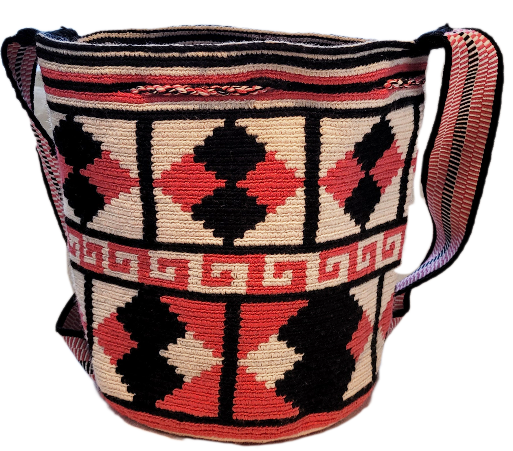 "Handmade Paleteada Wayuu crochet bag, colorful and bohemian, crafted by Colombian and Venezuelan artisans."