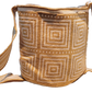 "Handmade Paleteada Wayuu crochet bag with colorful geometric patterns, crafted by Wuitusu artisans using vegan materials."