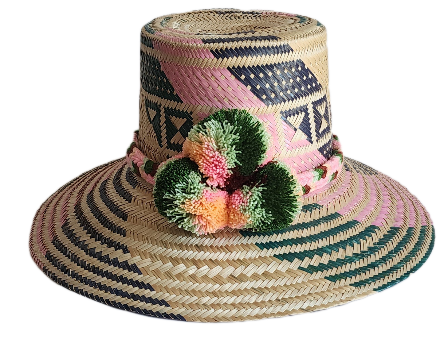 "Handmade, vibrant Wayuu hat crafted from Iraca palm fibers with culturally significant pompoms and adjustable fit."