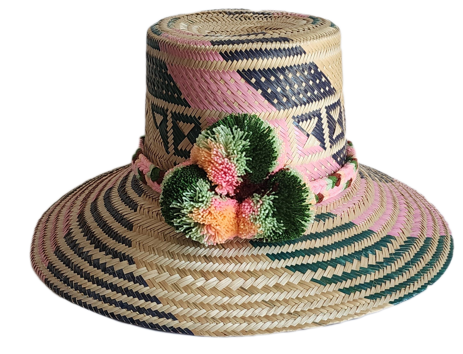 "Handmade, vibrant Wayuu hat crafted from Iraca palm fibers with culturally significant pompoms and adjustable fit."