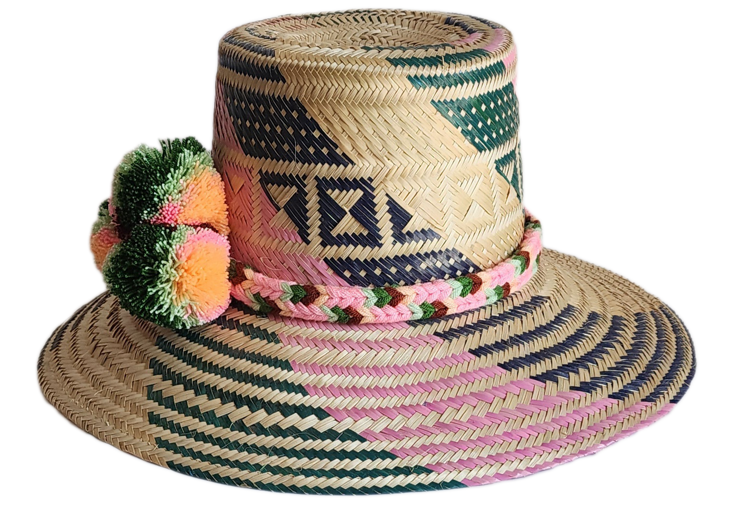"Handmade, vibrant Wayuu hat crafted from Iraca palm fibers with culturally significant pompoms and adjustable fit."