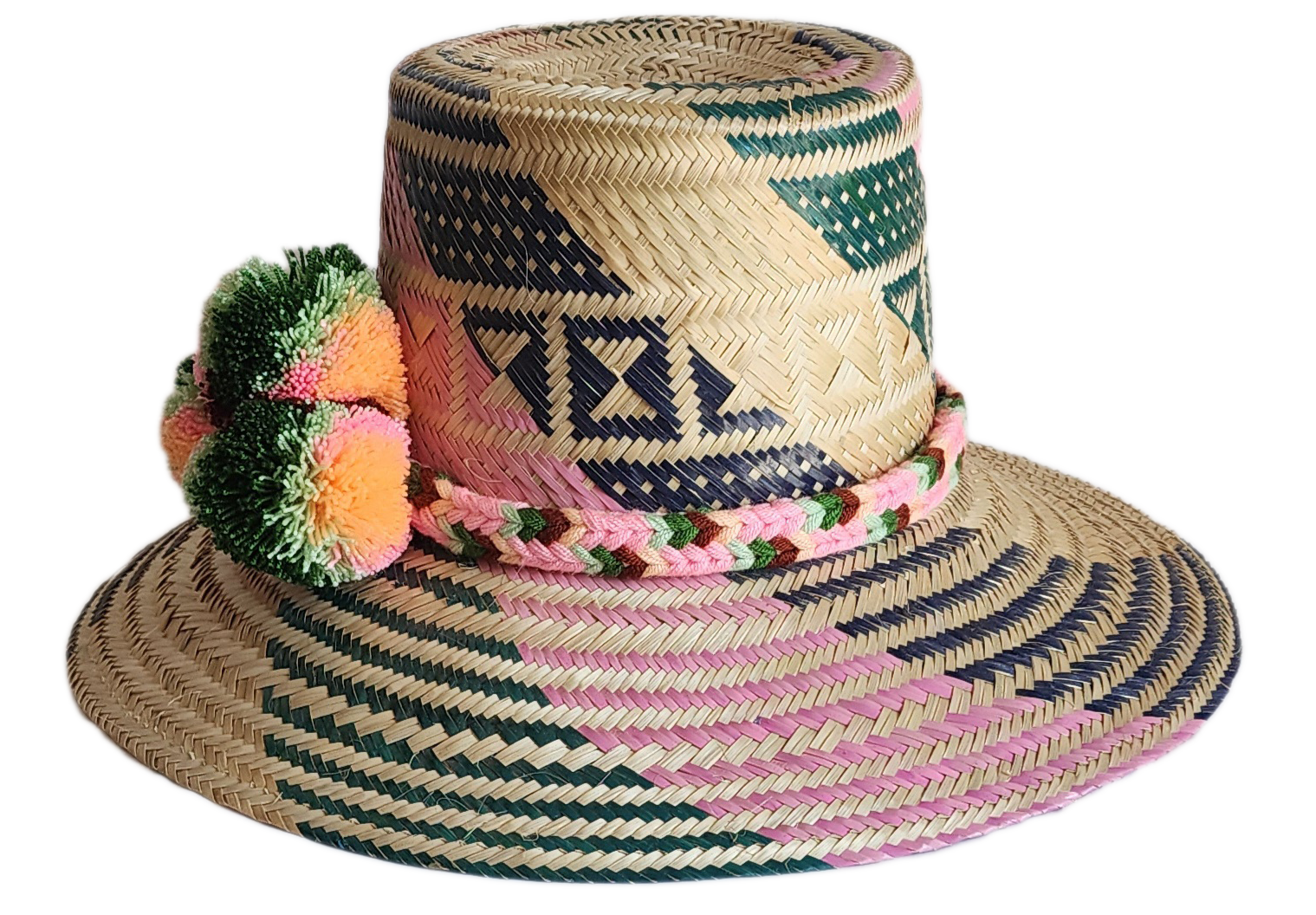"Handmade, vibrant Wayuu hat crafted from Iraca palm fibers with culturally significant pompoms and adjustable fit."