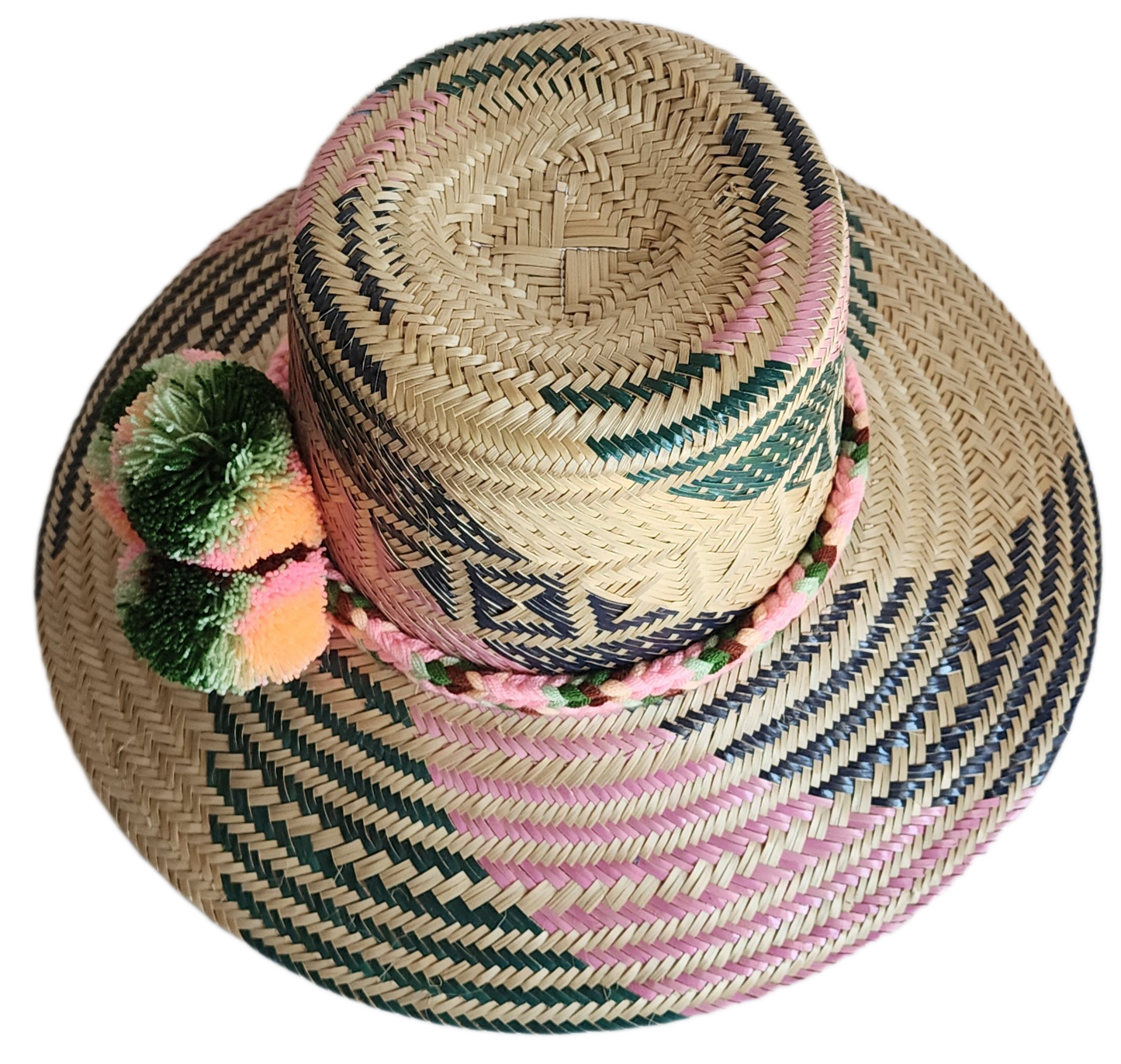 "Handmade, vibrant Wayuu hat crafted from Iraca palm fibers with culturally significant pompoms and adjustable fit."