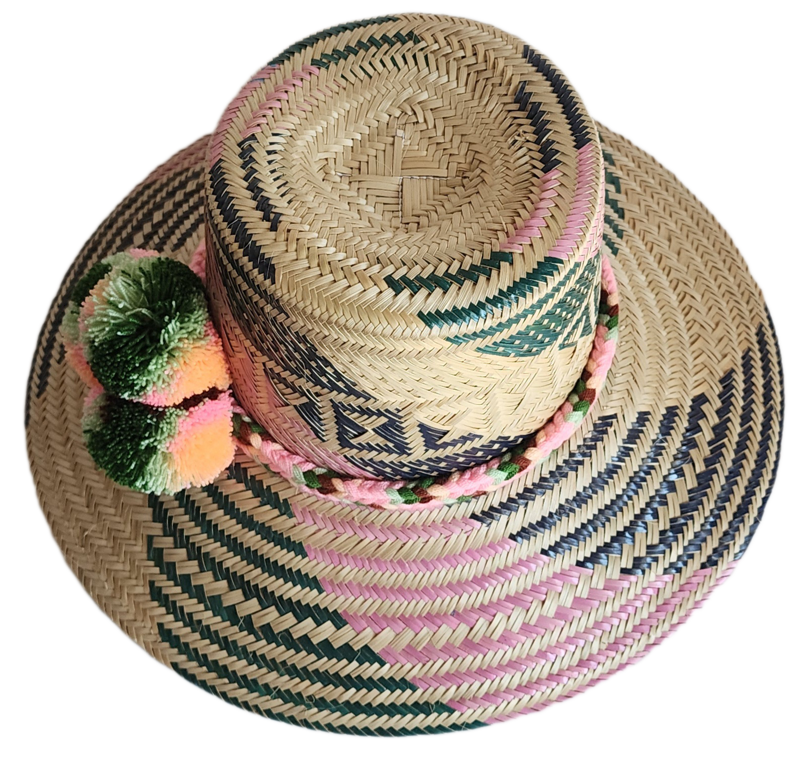 "Handmade, vibrant Wayuu hat crafted from Iraca palm fibers with culturally significant pompoms and adjustable fit."