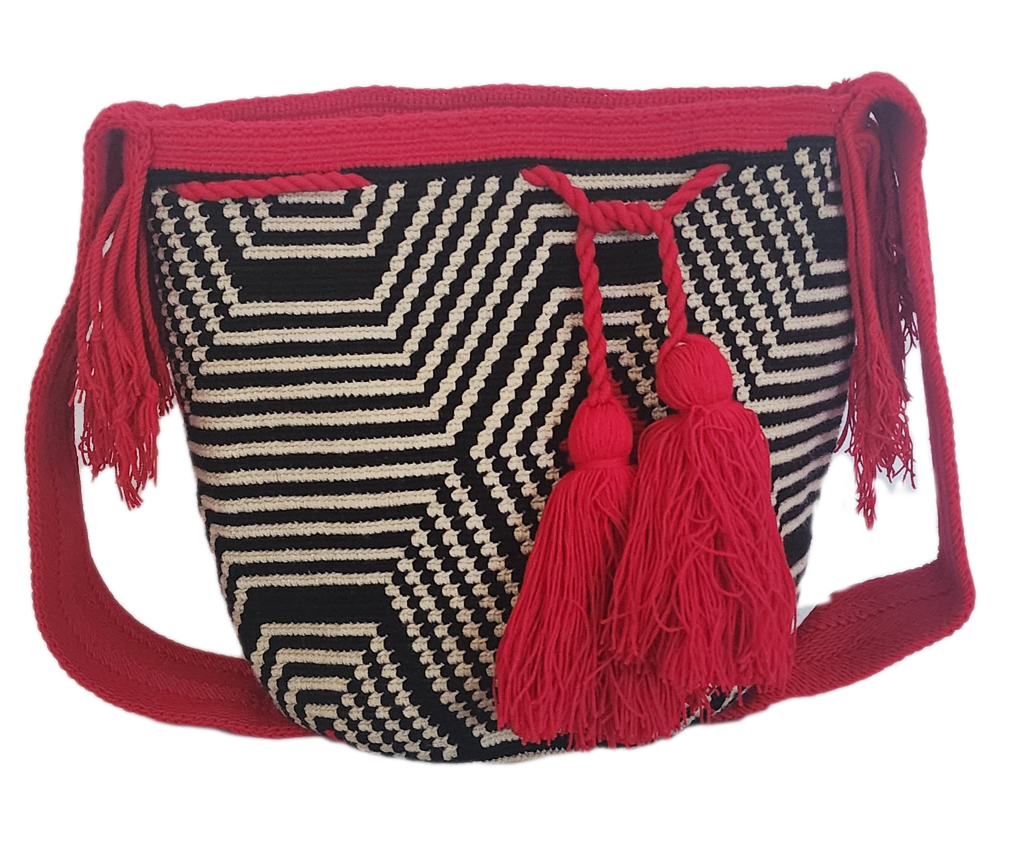 Handmade Wayuu bag featuring eye-catching black and white zigzag pattern, bright red crochet border, and oversized tassels — a bohemian standout.