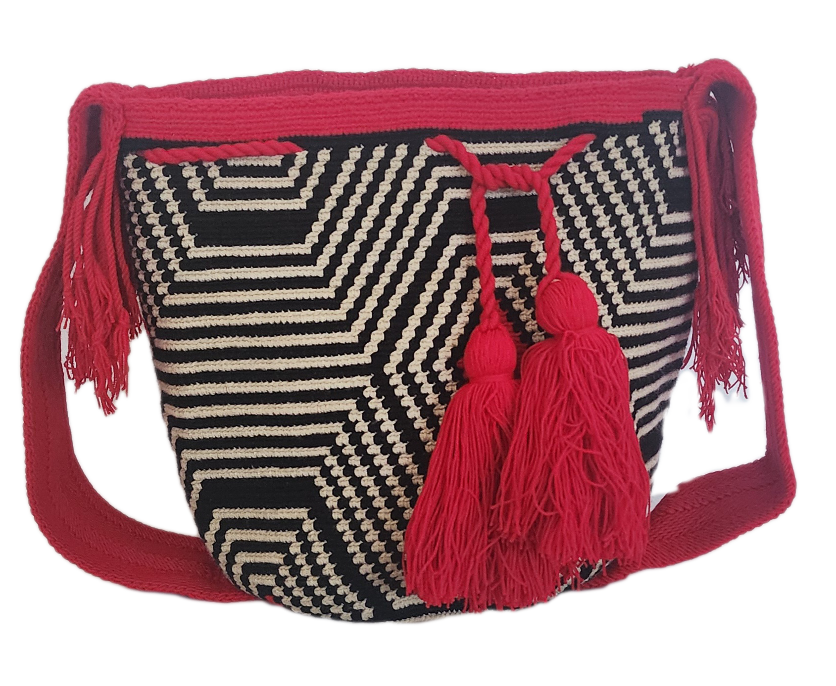 Handmade Wayuu bag featuring eye-catching black and white zigzag pattern, bright red crochet border, and oversized tassels — a bohemian standout.