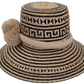 Boho straw hat with geometric Wayuu design in natural and black, finished with twin pompoms

