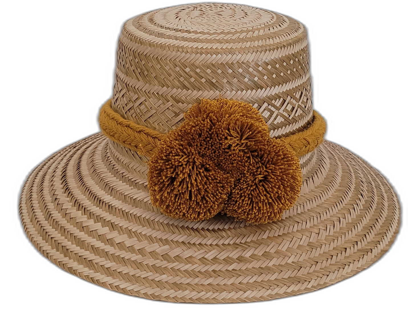 Handmade Wayuu boho straw hat with golden pompoms and natural woven pattern.

