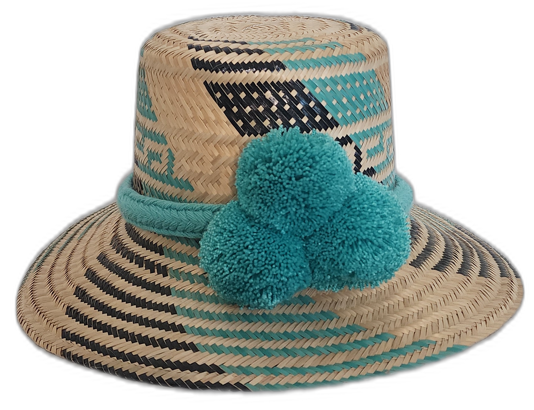 Handmade Wayuu boho straw hat with turquoise pompoms and bold black weave patterns.