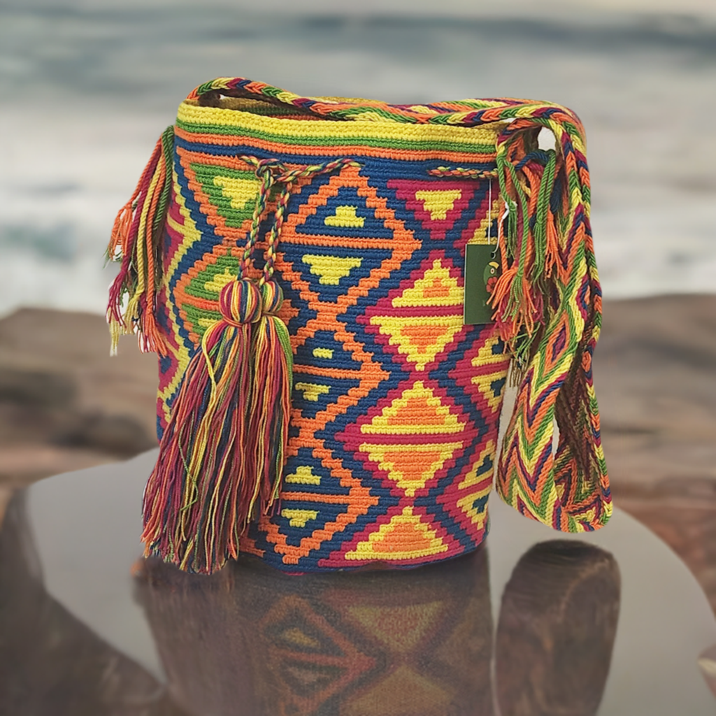 Handmade Wayuu crochet bag from Colombia, vibrant with cultural patterns and colors, supporting fair trade and Wayuu heritage