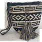 Black and white Wayuu crochet bag with long tassels and strap