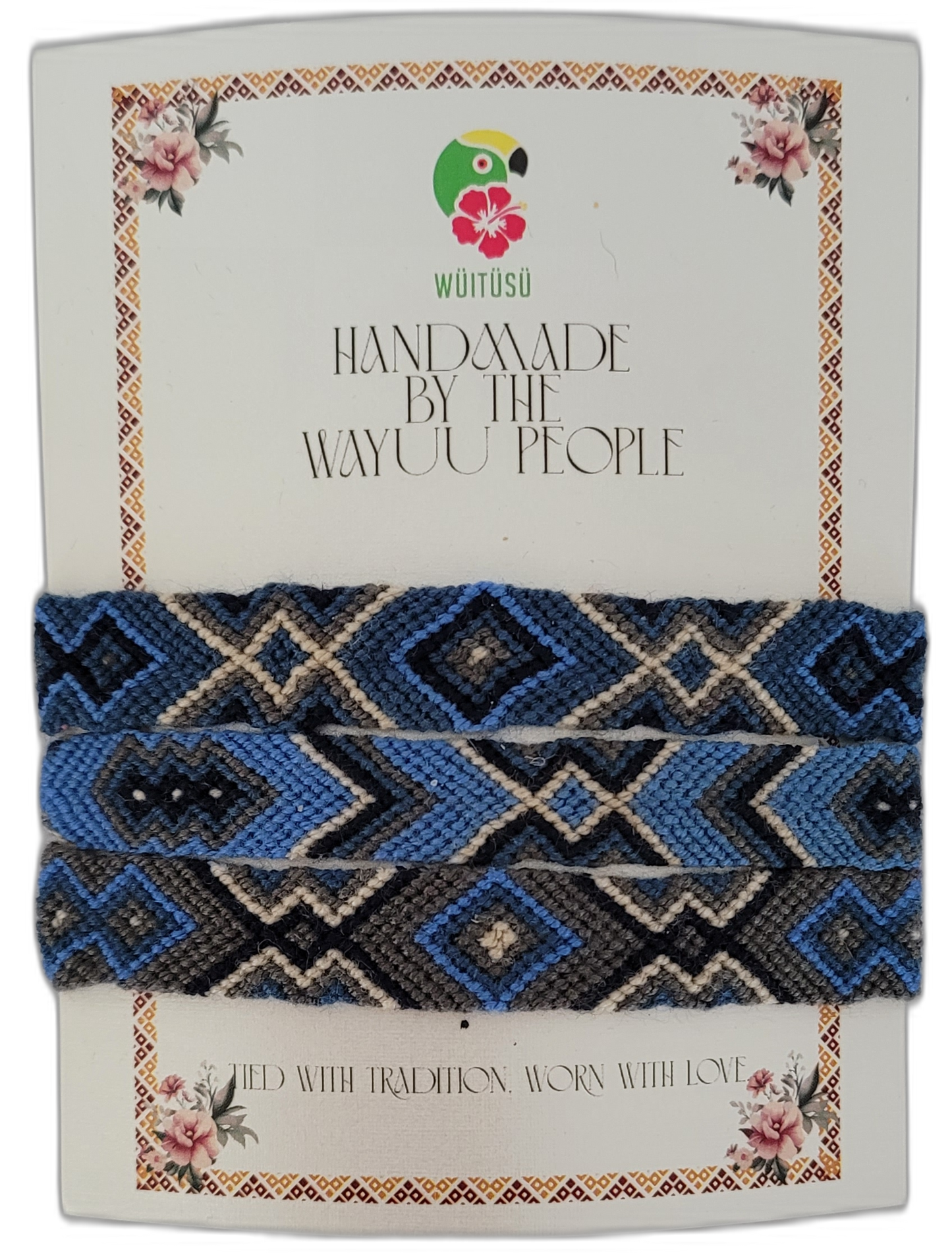Handmade Wayuu friendship bracelet featuring blue, black, gray, and cream — a beautiful Boho chic accessory with tribal patterns and artisan tradition.