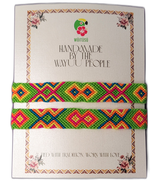 Handmade Wayuu friendship bracelets with bright geometric tribal patterns, artisan-crafted.