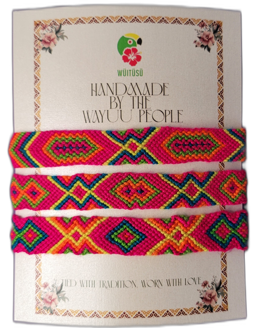 Handmade Wayuu friendship bracelets with multicolor tribal patterns, artisan-crafted and fair-trade