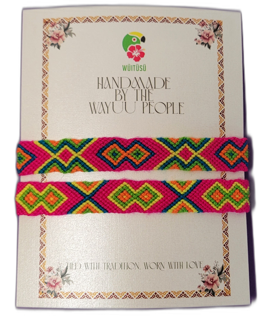 Handmade Wayuu friendship bracelets in neon pink, green, orange, and blue with tribal designs