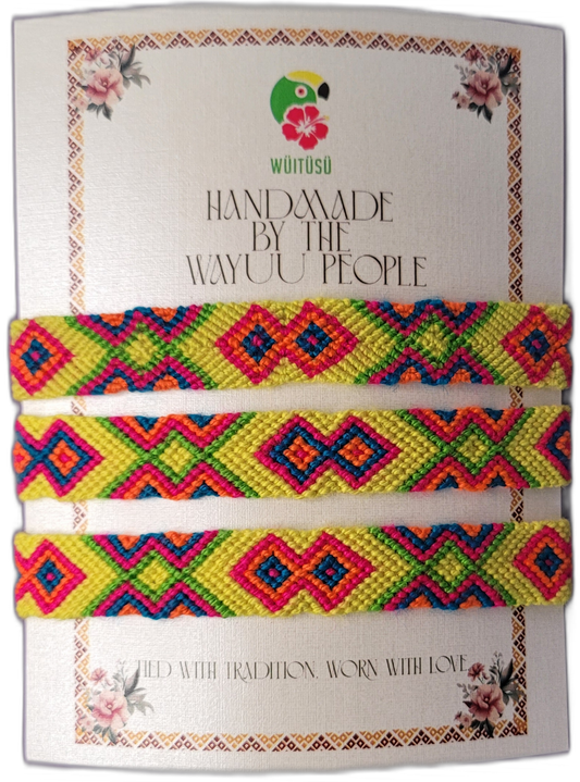 Handmade Wayuu friendship bracelets with bright tribal patterns and cultural meaning.