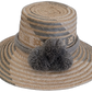 Handmade Wayuu straw hat with natural and gray weave, plus soft gray pompoms.

