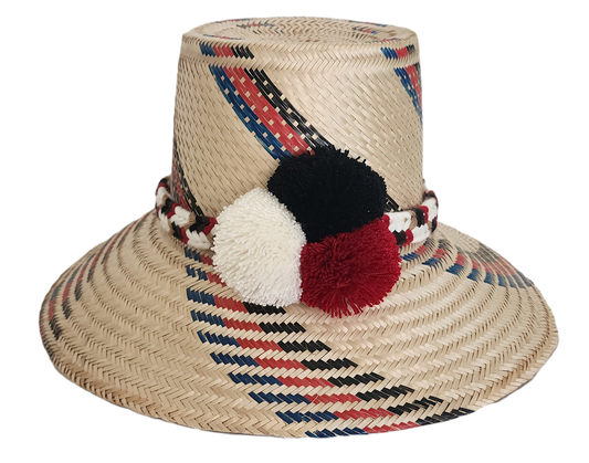 Handmade Wayuu straw hat with red, black, and blue diagonal patterns