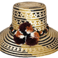 "Handmade Wayuu hat crafted from Iraca palm fibers, adorned with colorful pompoms, showcasing artisanal Colombian and Venezue